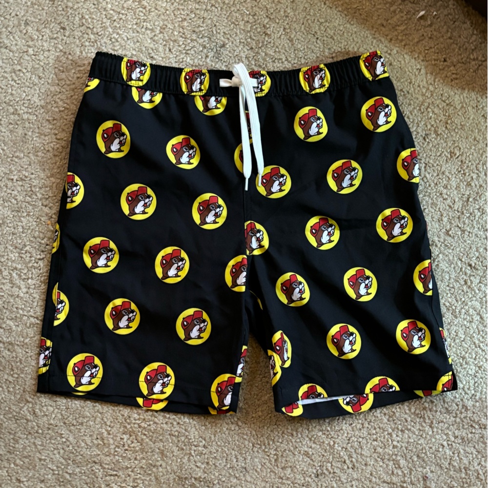 Buc-ee’s Kids Black Swim Trunks with Yellow & Red Logo Print